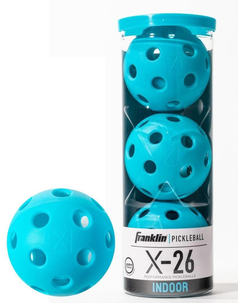 A clear tube of Franklin Indoor X-26 Pickleball Balls (3 Ball) - Blue by Franklin, featuring three bright blue USA Pickleball approved balls with holes, plus one extra blue ball shown outside the container in front.