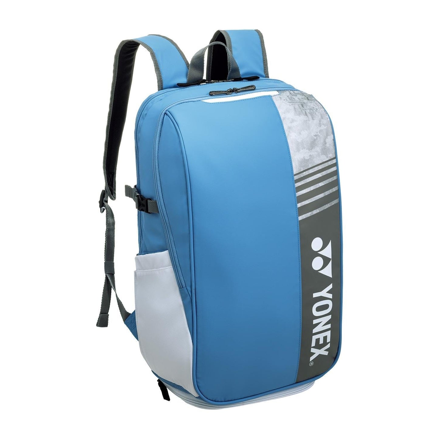 The Yonex 52512EX Club Tennis Backpack in Greyish Blue features a large main compartment, side pockets, and a front zip with grey stripes and a white Yonex logo, designed for club players with padded shoulder straps for comfort.