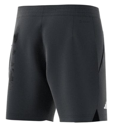 The rear of the ADIDAS Mens Paris Ergo Tennis Shorts in Carbon features understated branding on the side along with graphics inspired by clay surfaces. These shorts boast a sleek and minimalist design, enhanced by adidas' HEAT.RDY technology, ideal for athletic activities.
