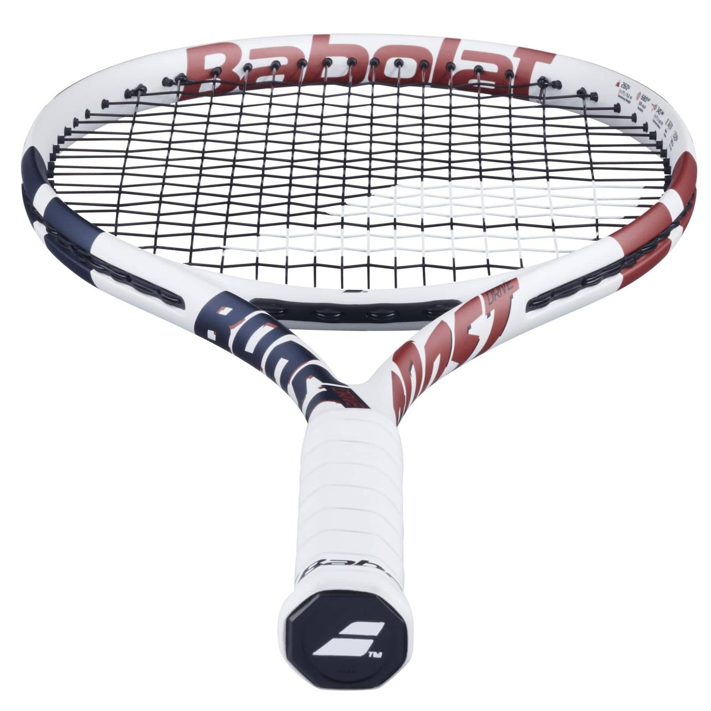The Babolat Boost Drive Tennis Racket in white showcases a black string pattern with navy and red accents. Its lightweight graphite frame boosts performance, while white grip tape covers the handle. The iconic Babolat logo is on the end cap, paired with the Woofer System for improved control.