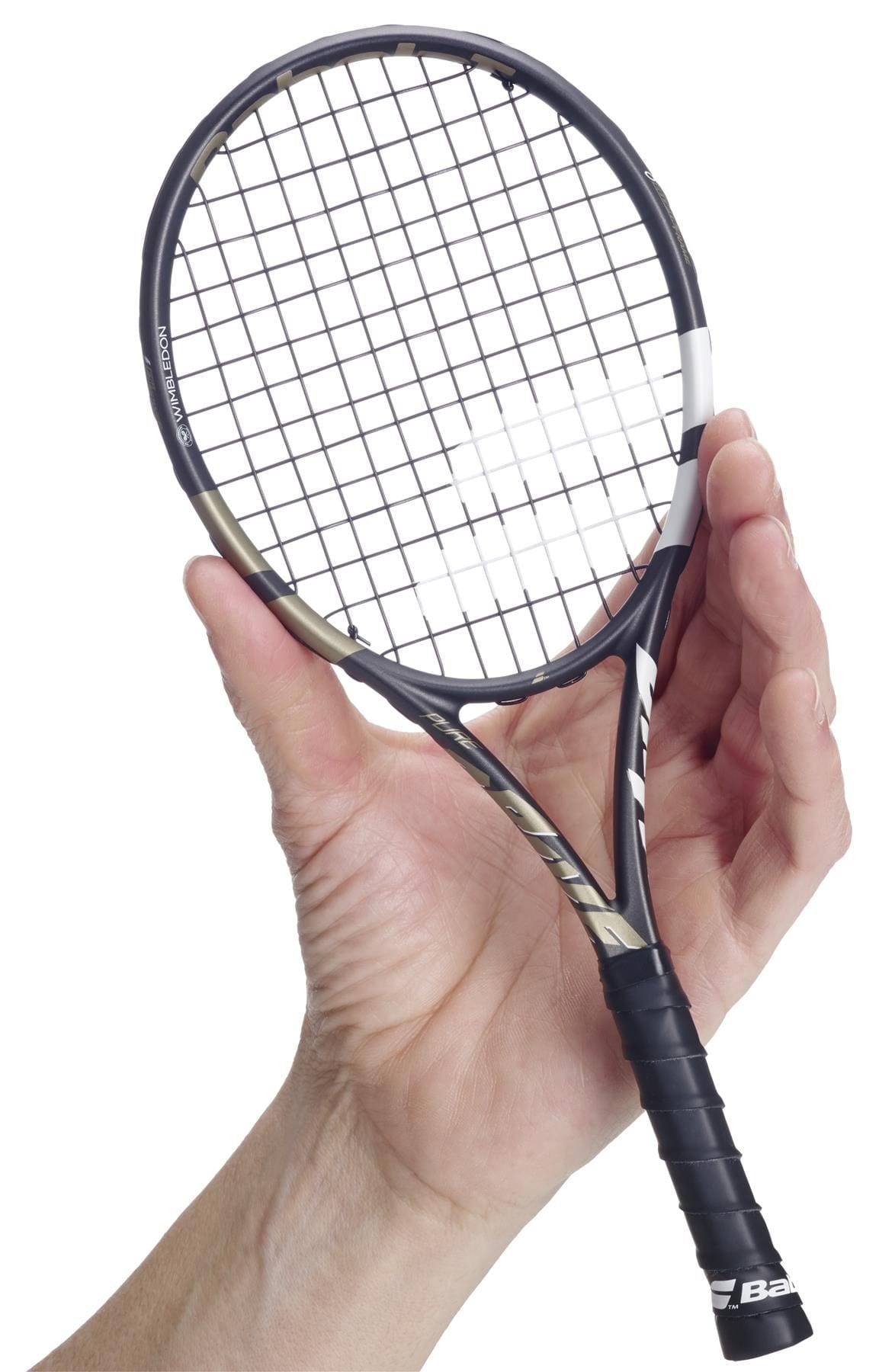 A person holds a Babolat Mini Pure Drive Wimbledon Tennis Racket with a grid-patterned string face against a white background—a perfect keepsake for tennis fans.