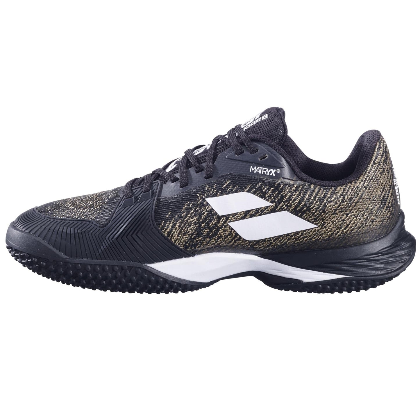 The Babolat Jet Mach 3 Sand Grass Men's Wide Tennis Shoes are black and white with a textured Michelin sole for grip, featuring a mesh upper with decorative stripes, branding near the laces and heel, and Matryx technology for enhanced performance and comfort.
