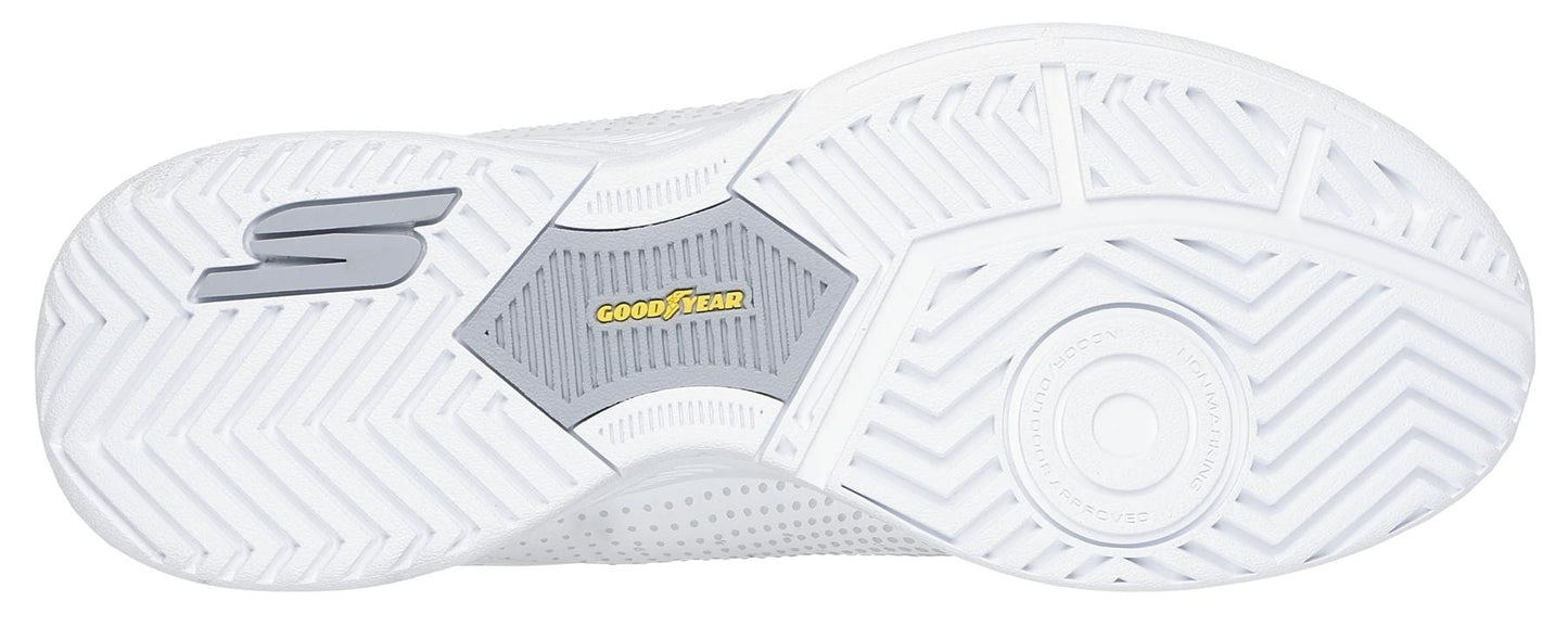 The image shows the white sole of Skechers Viper Court Reload Slip Ins Relaxed Fit Tennis Shoes with a bold tread, silver "S" logo on the left, and a yellow Goodyear Rubber logo in the center on a gray section.