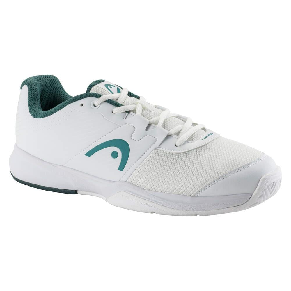 The HEAD Revolt Court Men's Tennis Shoes in White/Pine Green offer a sleek design with lightweight comfort, featuring a green side logo, green lining, white laces, a textured sole, and breathable mesh accents for better airflow.