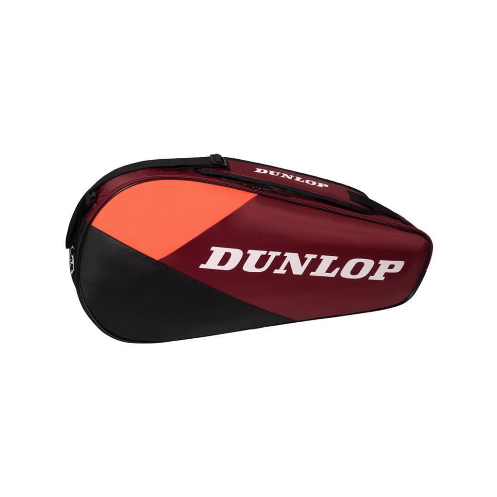 The Dunlop CX Club 3 Tennis Racket Bag in black and red features a zippered compartment and a handle. With the Dunlop logo in white on the side, this lightweight bag also includes padded backpack straps for easy carrying.