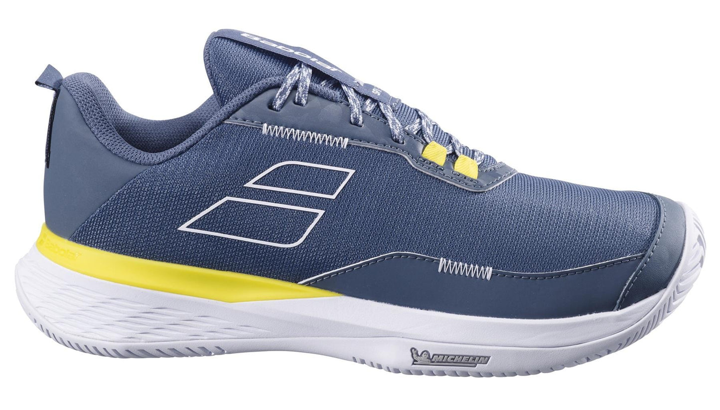 The Babolat SFX EVO Men's Tennis Shoes in Dark Grey/White feature a textured design and Michelin Original rubber for enhanced durability and grip, with stylish accents perfect for casual wear.