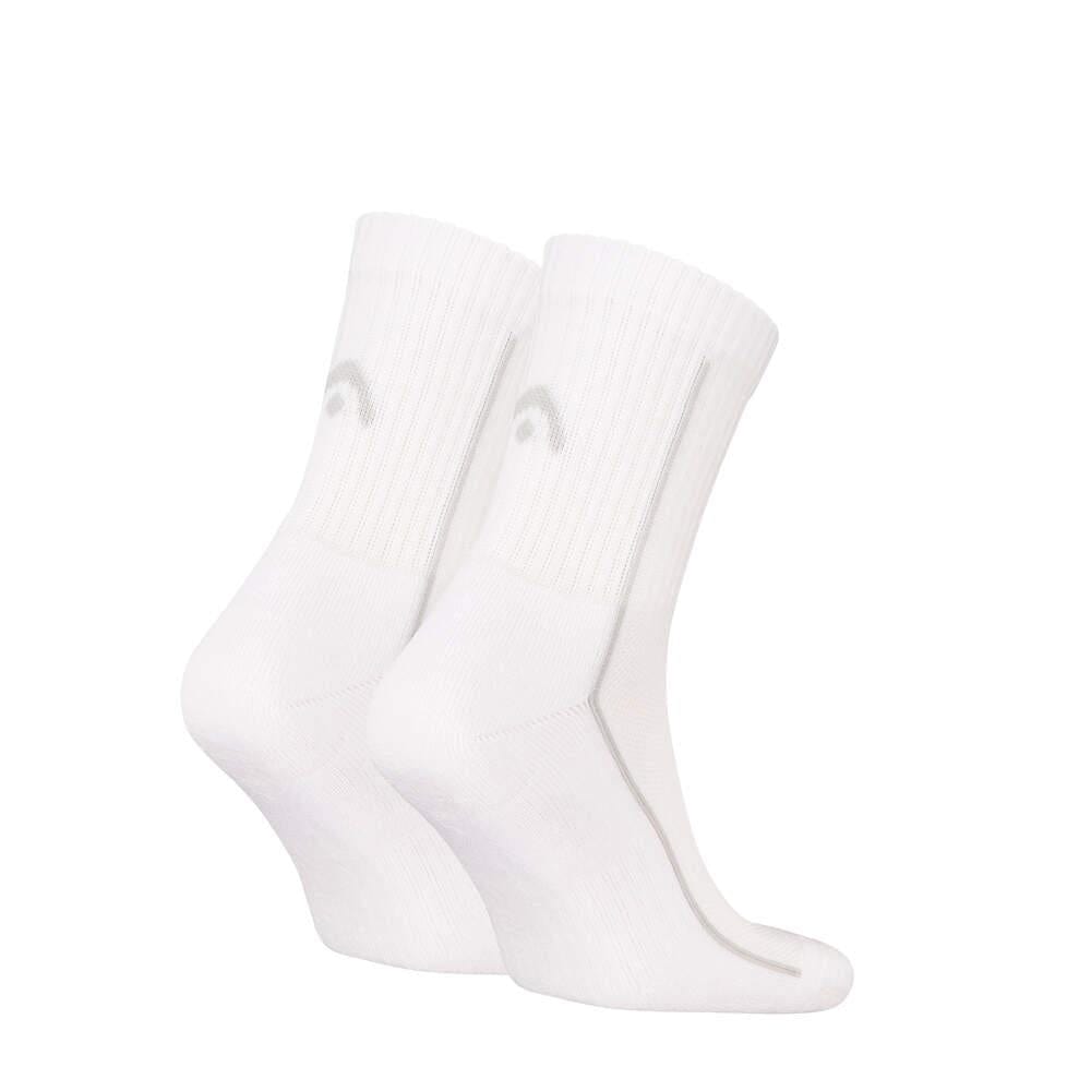 A pair of HEAD Performance Short Crew Tennis Socks in white, featuring a subtle gray logo, displayed on a plain background. They showcase ribbed texture, crew length style, and excellent breathability.