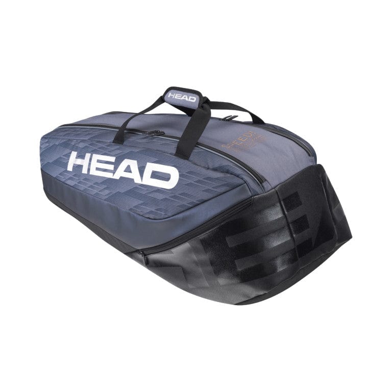 The HEAD Djokovic 9R Supercombi 9 Racket Tennis Bag, featuring a sleek black and gray design, prominently displays the "HEAD" logo in bold white letters. Crafted with a structured shape, it offers dual handles for easy carrying and a secure zippered closure. This bag is part of the SPEED racket series and includes climate control technology to keep your gear protected.