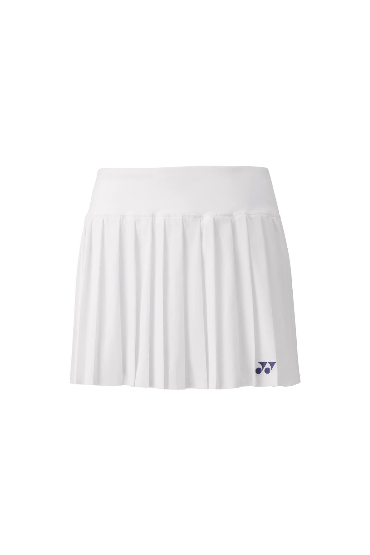 The Yonex 26123 Women's Tennis Skirt in white is a pleated skirt perfect for tennis, subtly displaying the brand's logo on the lower right. Made with Xylitol cooling material, this skirt is designed for peak performance during tournaments, presenting a clean and classic look that highlights simplicity and elegance.