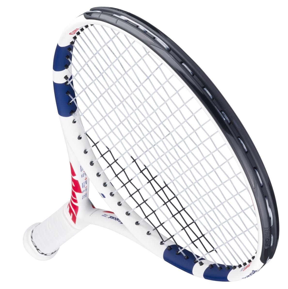 Close-up of the Babolat Drive Junior 24 Tennis Racket – White, designed for intermediate players, featuring a white frame and strings with red and blue accents on the handle. The racket is angled diagonally with its head facing upward to the right.