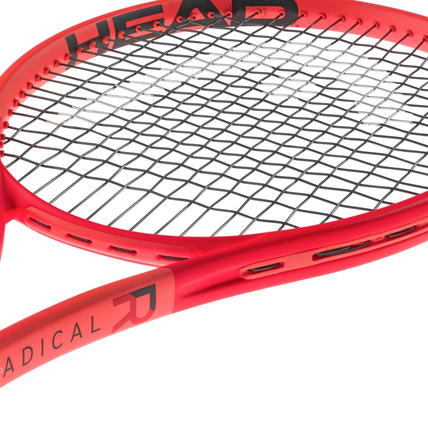 Close-up of an orange HEAD Radical MP 2025 tennis racket with black strings. The frame displays "RADICAL" in bold. Crafted for all-court performance, this stylish racket is enhanced with cutting-edge Auxetic 2.0 technology, standing out against a white background.