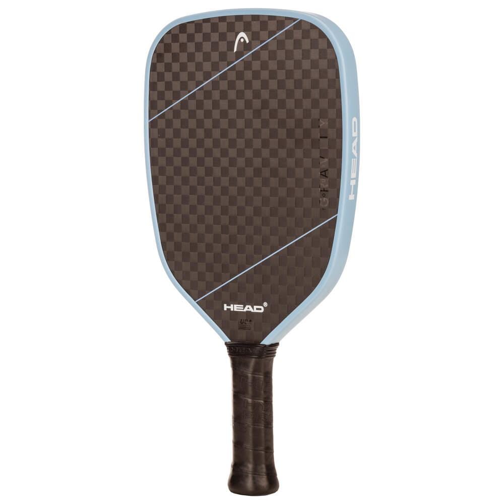 The HEAD Gravity Tour 2025 Pickleball Paddle - Carbon Black / Blue features a checkered 12K Carbon face, light blue edges, black handle, and “HEAD” branding, all with advanced ThermoTech performance.