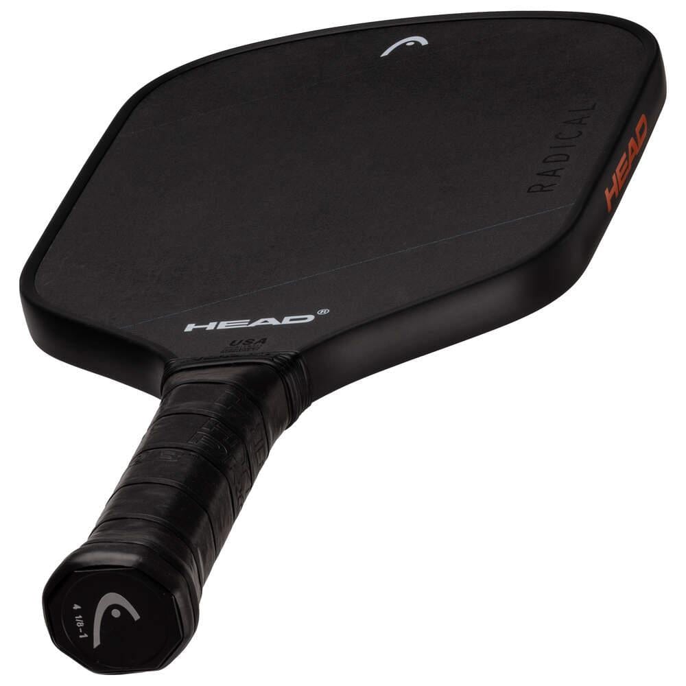 The HEAD Radical Nite Pickleball Paddle - Black is displayed against a white background, featuring a textured grip, angular edges, and SpinFusion technology. The "HEAD" brand name appears on both the paddle face and edge.