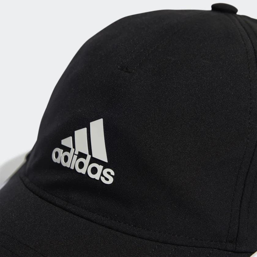 A close-up of the adidas Aeroready Baseball Cap - Black, crafted with recycled materials, displays the classic white adidas logo on its front panel against a plain, light-colored background.