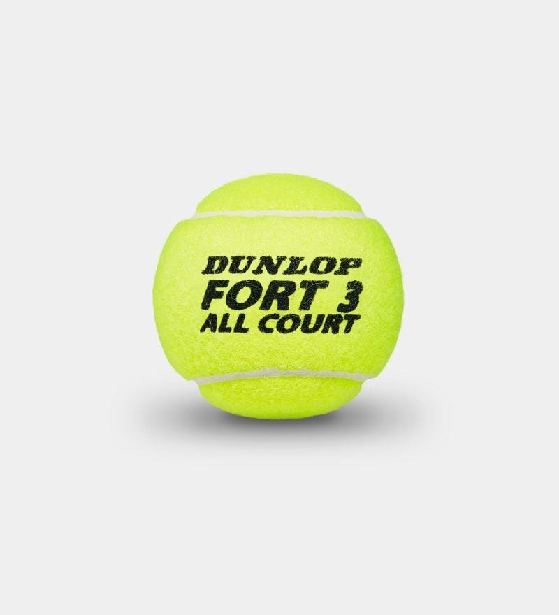 A vibrant yellow tennis ball prominently displays the "Dunlop Fort All Court" logo in bold black text against a simple white backdrop, highlighting its ITF-approved quality and cutting-edge Dunlop HD Core technology.