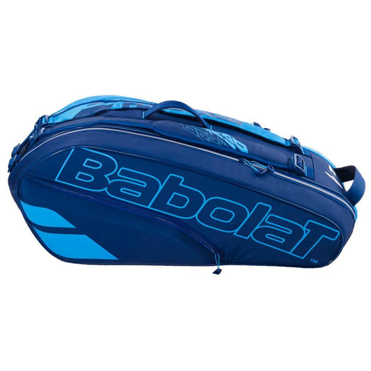 The Babolat RH6 Pure Drive 6 Racket Tennis Bag - Blue is a spacious bag that showcases prominent branding and includes a zippered, insulated compartment for your tennis gear. It features a recycled PET lining and comfortable shoulder straps, making it an ideal choice for environmentally-conscious players on the move.