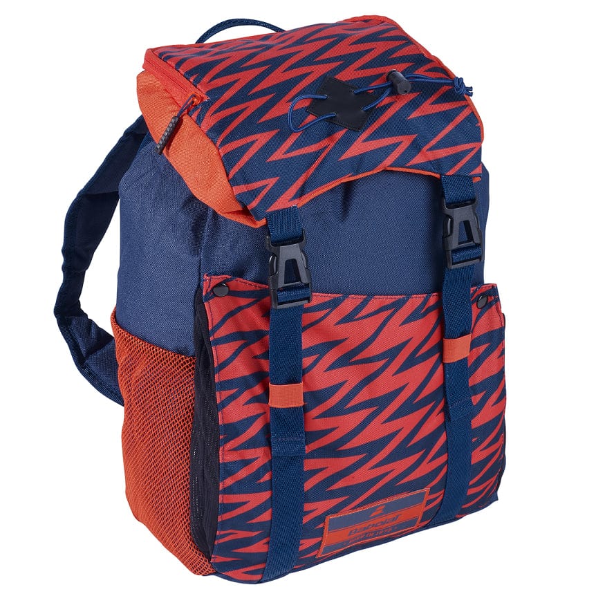Introducing the Babolat Junior Classic Tennis Backpack in a chic blue and red design. This backpack features an orange top flap with black buckles, two side mesh pockets, adjustable shoulder straps, and a convenient racket holder. It's perfect for school or outdoor activities.