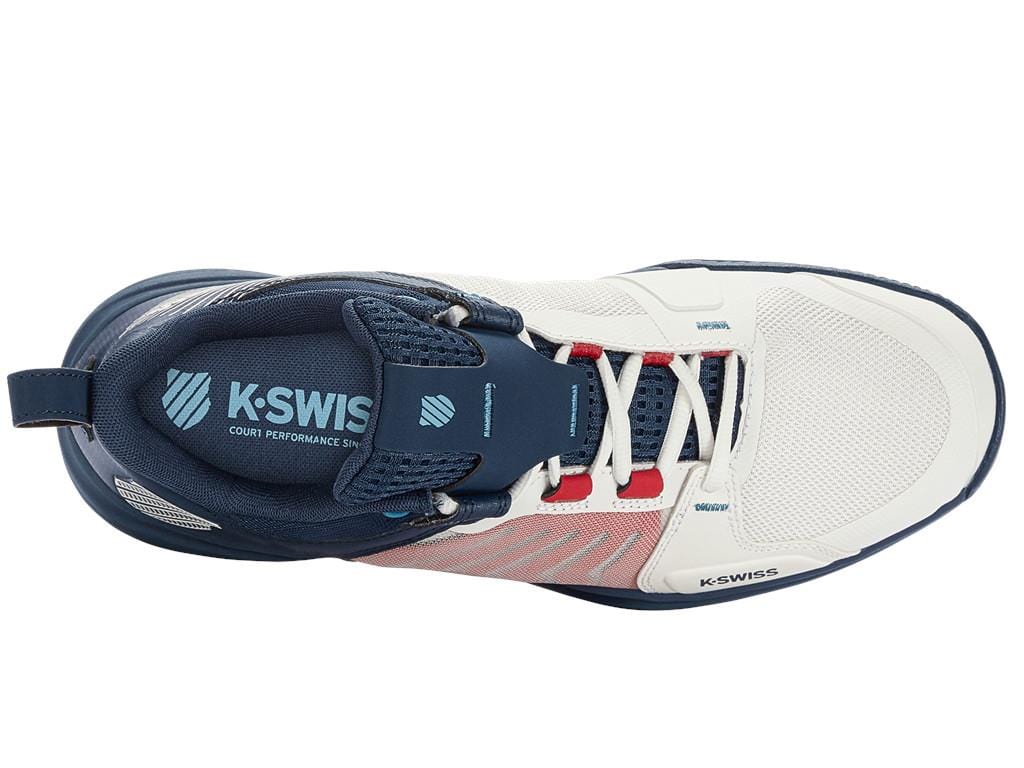 Top view of the K-Swiss Ultrashot Team Men's Tennis Shoes. The shoe showcases a white and blue opal color scheme with lollipop red accents. The K-Swiss logo is prominently displayed on the tongue and side. This contemporary design, ideal for men's tennis footwear, features a mesh texture for enhanced breathability.