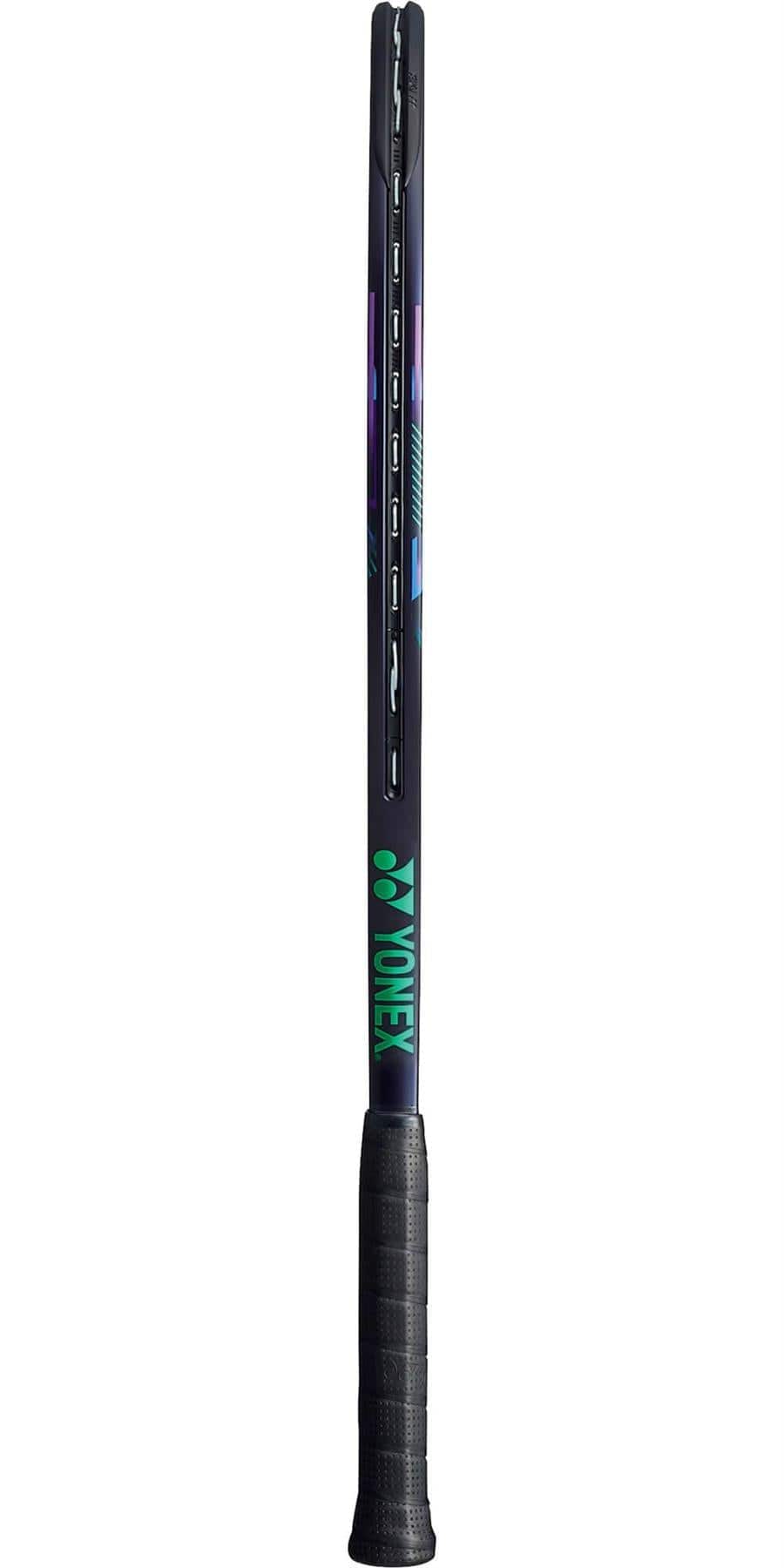 A Yonex VCORE Pro 100 tennis racket in green and purple displays a Yonex logo on the handle, viewed from the side. The grip is black, and its frame showcases a sleek, modern design that enhances precision and feel on the court.