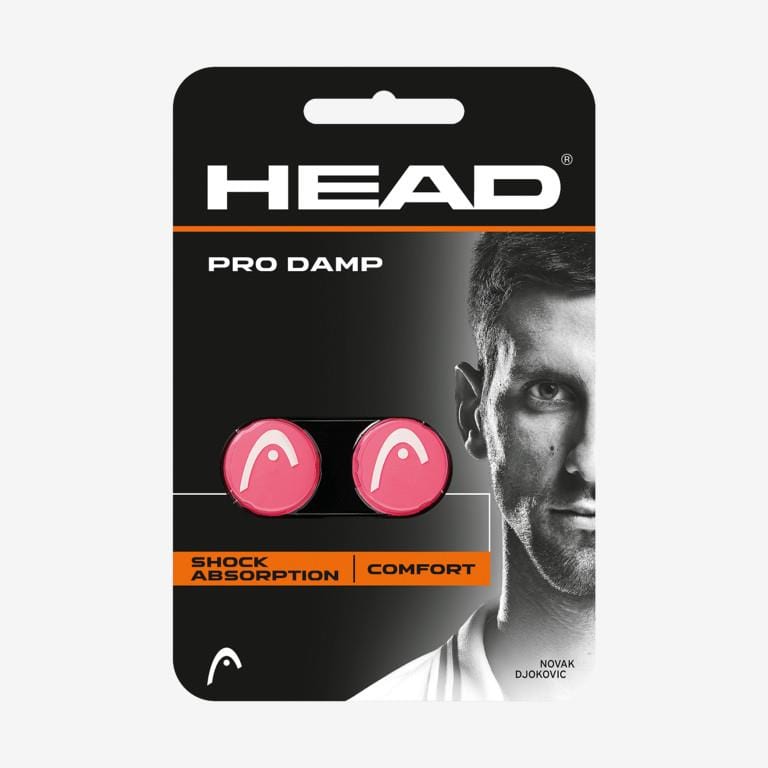 Packaging for the HEAD Pro Damp Tennis Dampener by HEAD, showcasing two pink circular dampeners with a logo. Crafted from silicone material to improve vibration reduction, the packaging displays a grayscale image of a partially visible man on the right side.