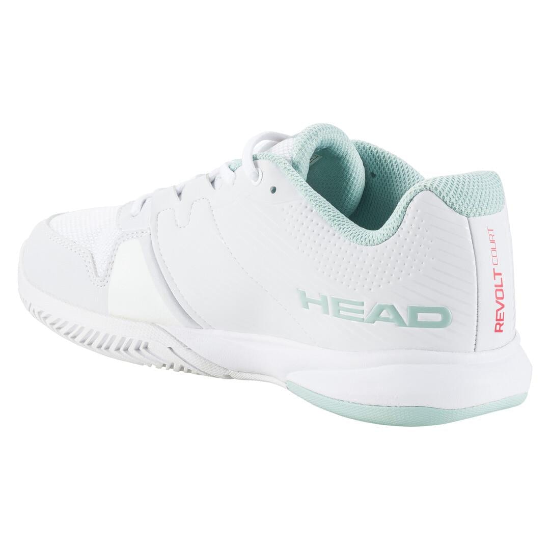 Introducing the HEAD Revolt Court Women's Tennis Shoes in White and Grey. These lightweight tennis shoes feature the brand name "HEAD" on the side, a textured sole for optimal grip, and a mesh-like upper material for breathability. With "REVOLT COURT" printed in red on the heel, they combine style and comfort perfectly.
