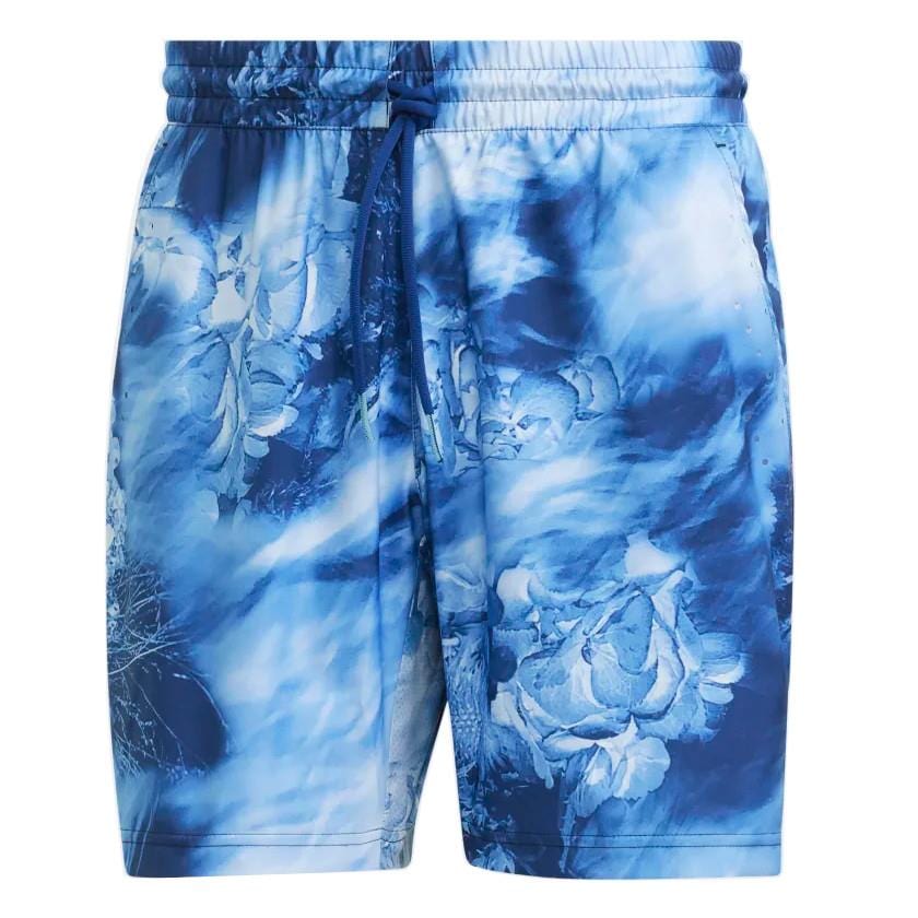 These adidas Melbourne Men's Ergo Graphic Tennis Shorts - Victory Blue are expertly crafted from recycled materials, showcasing a striking floral pattern in shades of blue and white. Designed with comfort in mind, they feature an elastic waistband and drawstring, making them perfect for any tennis event.
