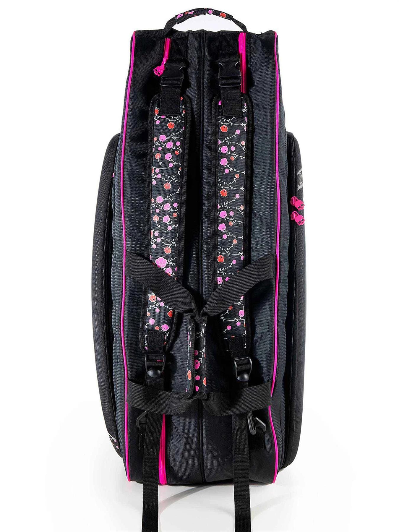 The Prince Hydrogen Lady Mary 6 Racket Tennis Bag in black and pink, featuring pink floral patterned straps and multiple compartments, resembles a fashionable tennis bag with a stylish design. It includes a pink handle at the top and is showcased against a white background.