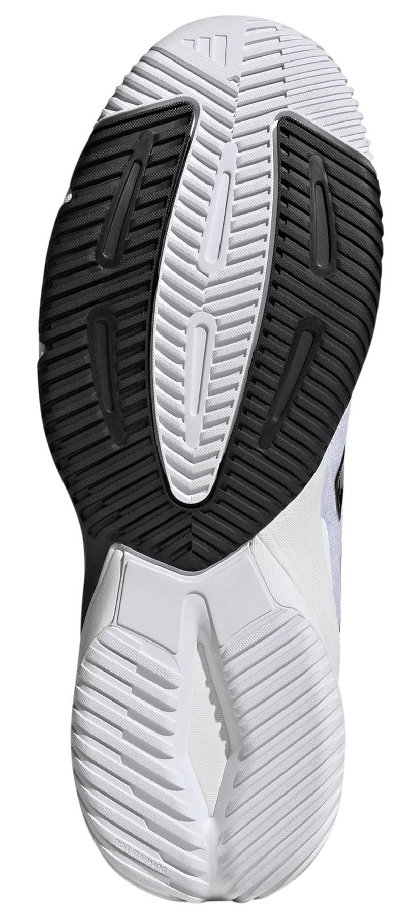 Close-up of the sole on adidas Crazyflight 6 Men's Indoor Tennis Shoes in white, featuring black and white rubber with textured grooves and geometric shapes for excellent grip—perfect for tennis.