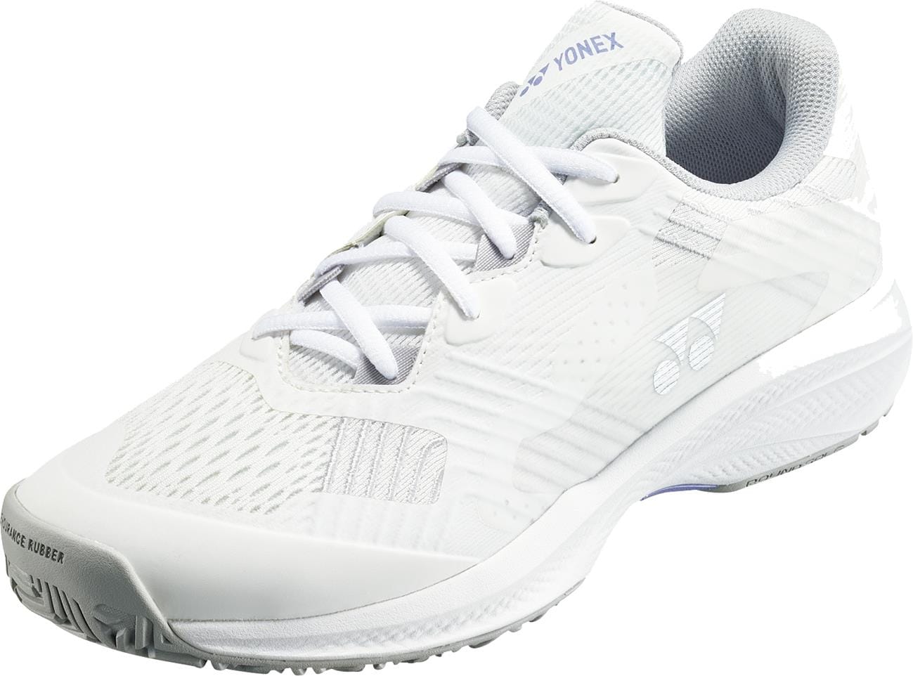 The Yonex Power Cushion Sonicage Women's Tennis Shoes in White/Grey are shown angled to display the side and front, featuring a textured upper, grey lining, white laces, and grooved rubber sole for lightweight comfort in every match.