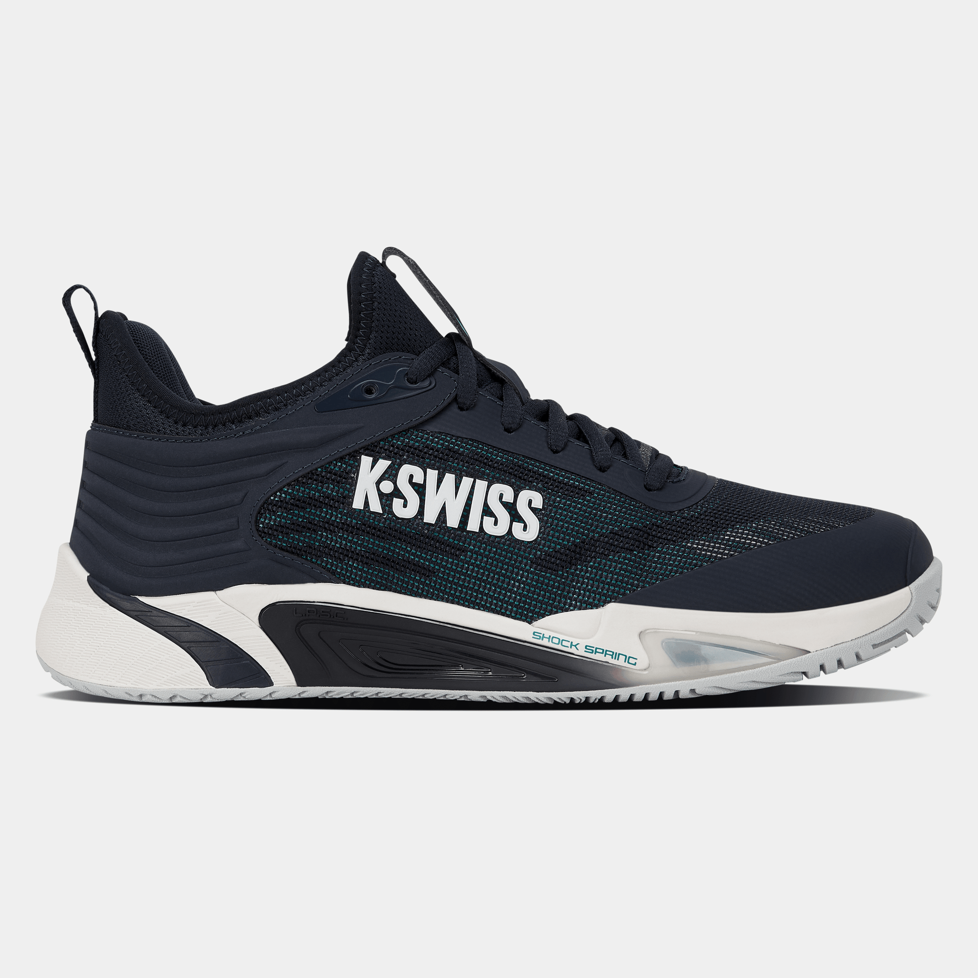 A K-Swiss Hypercourt Pinnacle Men’s tennis shoe in Carbon, White, and Baltic is displayed in a left-side profile view against a plain white background. The shoe features a navy-inspired upper with white K-Swiss logo accents, breathable mesh side paneling, a clean white midsole, and a dark outsole—all combining for a sleek design.