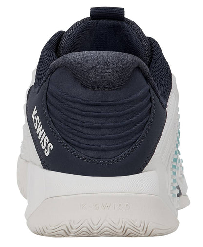 Rear view of the K-Swiss Hypercourt Express 3 Men's Tennis Shoe in White/Carbon/Baltic, showcasing a dark navy (Baltic) heel, white outsole, ribbed heel collar, and prominent K-SWISS branding on both the heel and side. Designed with a Surgelite+ midsole for lightweight cushioning and featuring a textured sole pattern for enhanced grip.