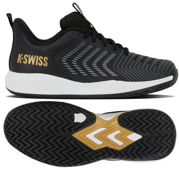 The K-Swiss Ultrashot Light Men's Tennis Shoe in Moonless Night, White, and Gold features a lightweight black design with a gold K-Swiss logo, white midsole, black laces, and a patterned outsole accented in gold and white. One shoe is displayed from the side while the other showcases the sole.
