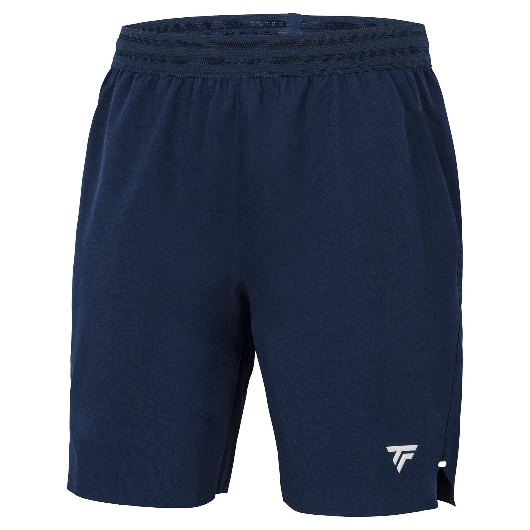 Tecnifibre Team Stretch Men's Tennis Shorts in marine blue feature an elastic waistband and a small white logo on the lower left leg, offering comfort and mobility for every match.