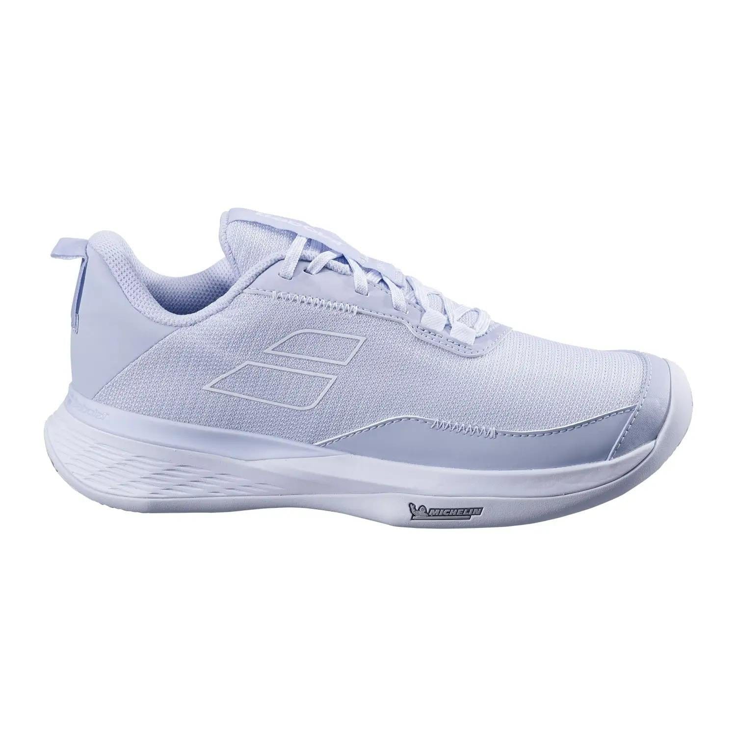 The Babolat SFX Evo Carpet Women’s Tennis Shoes in Xenon Blue/White feature a mesh upper, lace-up closure, and rubber outsole for a wide fit and minimal design—ideal for all-court play. Shown in side profile on a plain white background.