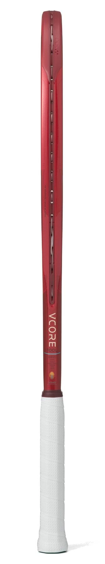 The Yonex 08 VCORE 100L 2026 Tennis Racket in ruby red is shown from the side with a white grip and "VOICE" on the throat, showcasing its impressive spin potential.