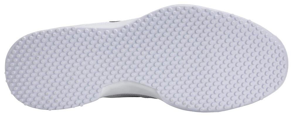 The image shows the white rubber outsole of the HEAD Sprint Pro 4.0 Women's Grass Court Tennis Shoes, with small, evenly spaced rounded studs across the surface for traction.