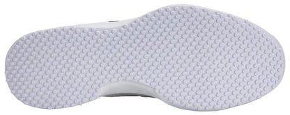 The image shows the white rubber outsole of the HEAD Sprint Pro 4.0 Women's Grass Court Tennis Shoes, with small, evenly spaced rounded studs across the surface for traction.