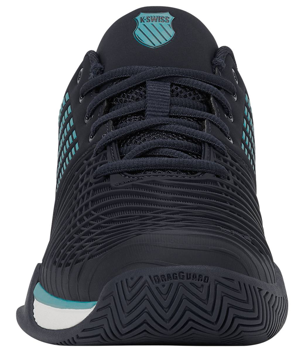 K-Swiss Express Light 3 Men's Tennis Shoe in Carbon/White/Baltic, viewed from the front, features teal accents, textured laces, mesh details, and “DRAGGUARD” branding on the rubber sole. This design includes a supportive K-EVA midsole for enhanced comfort and DuraWrap Flex technology for added durability—making these K-Swiss tennis shoes built to last.