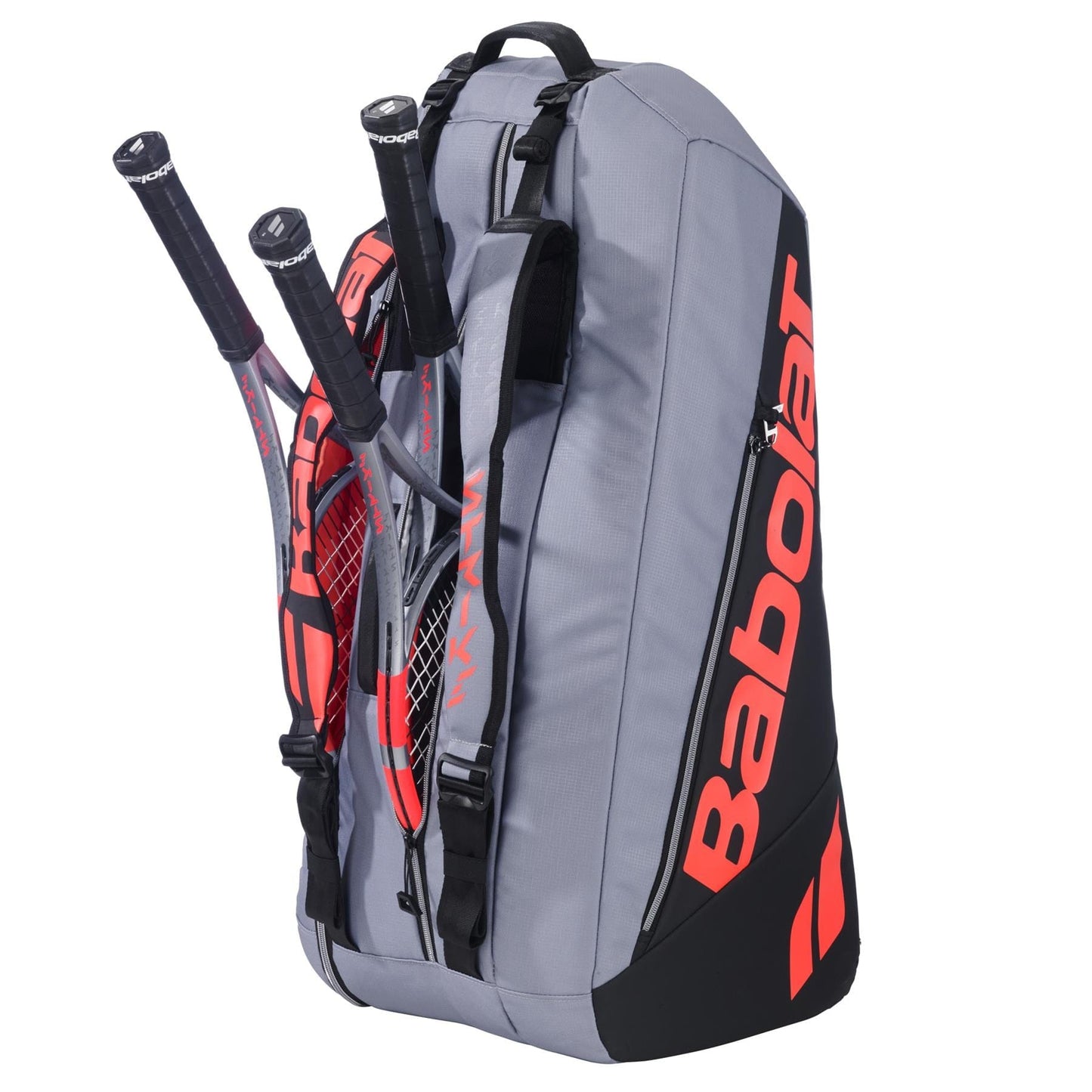 A large Babolat RH6 Pure Strike 6 Racket Tennis Racket Bag in Carbon Grey holds three rackets with black handles protruding from its external compartments.