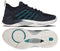 The K-Swiss Hypercourt Supreme 2 Men's Tennis Shoes in Carbon, White, and Baltic feature a high-performance design with black uppers, striking blue accents, and a white sole. Shown from both the side and bottom views, these shoes showcase signature striped detailing and a textured patterned outsole for enhanced drag protection—ideal for tennis players seeking durability and style.
