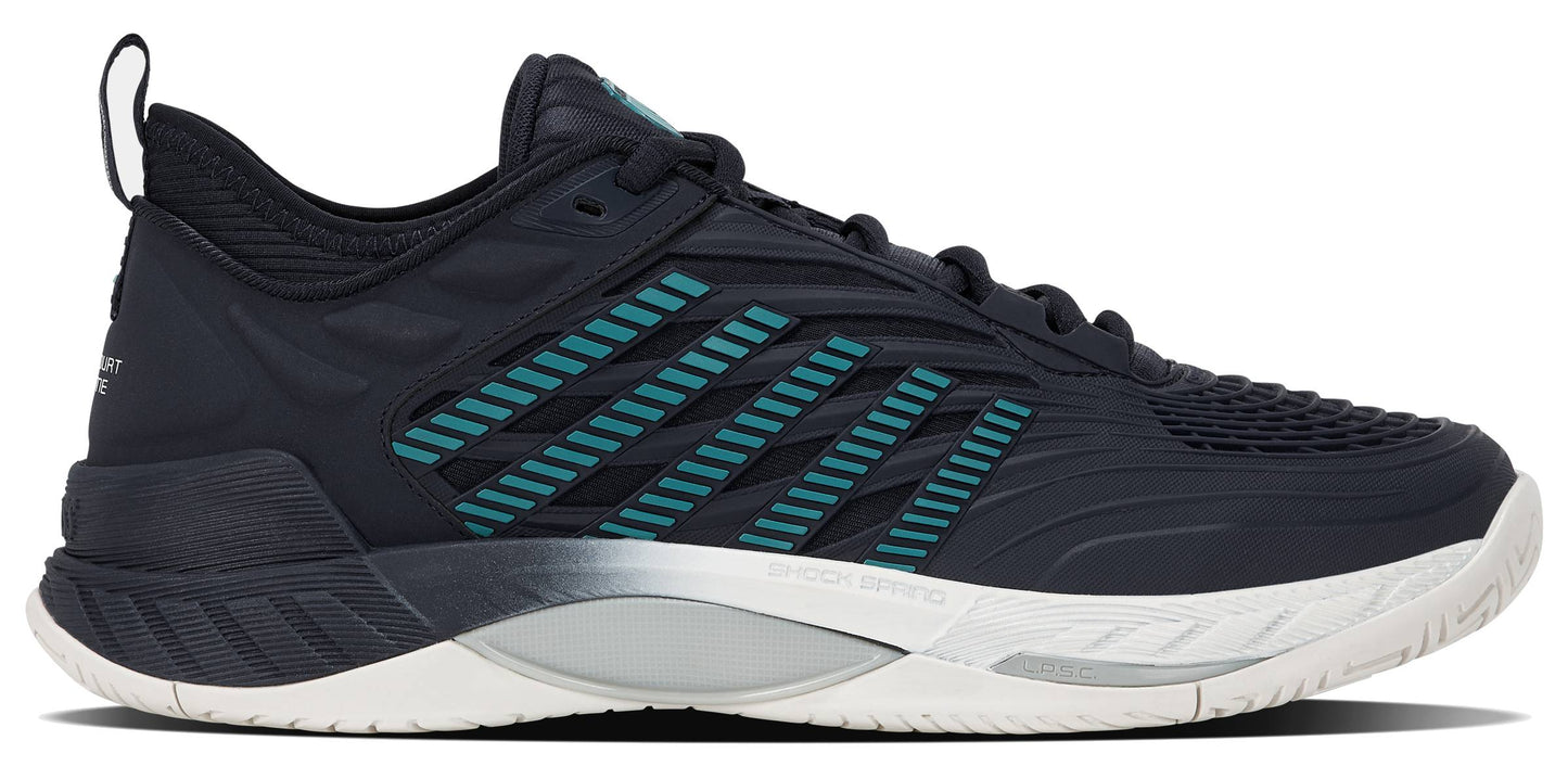 The K-Swiss Hypercourt Supreme 2 Men's Tennis Shoes in Carbon, White, and Baltic feature a dark athletic design with teal and gray accents, highlighted by horizontal stripes, a textured upper, and a white sole. These high-performance shoes from K-Swiss deliver exceptional drag protection for intense tennis matches.