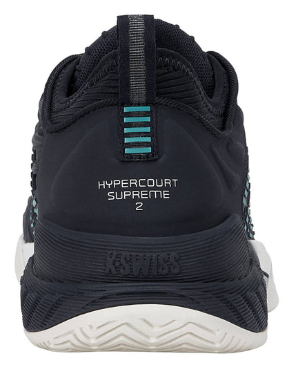 A rear view of the K-Swiss Hypercourt Supreme 2 Mens Tennis Shoes in Carbon, White, and Baltic shows "HYPERCOURT SUPREME 2" text on the heel and teal accent lines above it. These high-performance tennis shoes from K-Swiss feature a durable Dragguard outsole for enhanced traction.