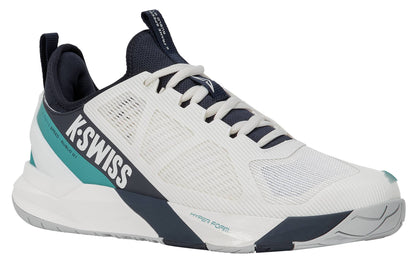 Step into performance with the K-Swiss K-Frame Speed Rublo Men’s Tennis Shoes in White, Carbon, and Baltic. These athletic sneakers feature a breathable mesh upper, lace-up closure, and eye-catching black (carbon), teal (baltic), and gray accents. Designed for stability with signature K-Frame technology—as worn by Andrey Rublev—these shoes sport a thick "Hyper Form" sole for added support. Bold K-Swiss branding stands out along the side for unmistakable style on or off the court.