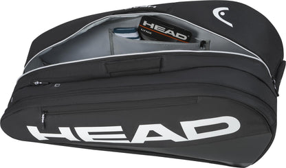 The HEAD Tour 9 Racket Tennis Bag L - Black by HEAD features a large white logo, spacious interior, and an inner pocket holding a tennis string package, shown unzipped for display.