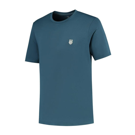 The K-Swiss Hypercourt Basic Crew Men's Tennis T-Shirt by K-Swiss showcases a simple Indian teal design with short sleeves and a small shield emblem on the left chest, set against a white backdrop.