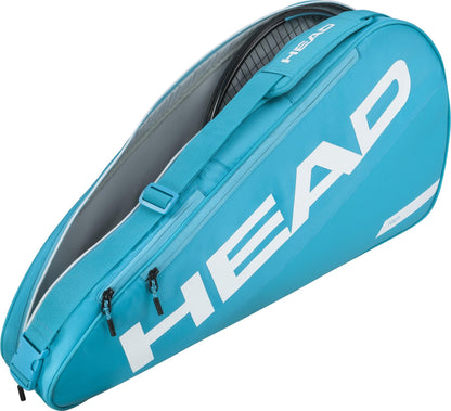 The HEAD Tour 3 Racket Tennis Bag S - Blue is a compact bag with white branding, two zippered compartments, and a shoulder strap, designed by HEAD to carry and protect tennis rackets.