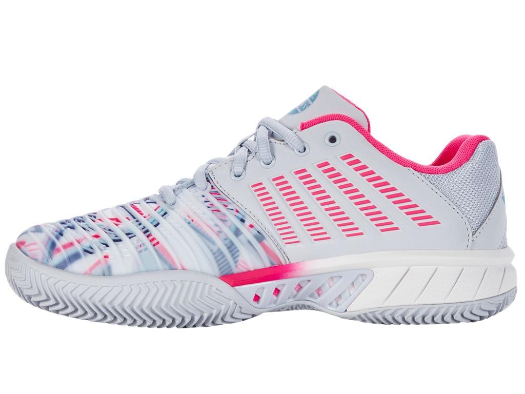 Introducing the K-Swiss Express Light 3 HB Indoor Court Women's Tennis Shoes in Arctic, White, and Neon Pink. Designed for tennis enthusiasts, this stylish footwear features a light gray base accented with vibrant pink and blue. It comes equipped with a textured sole for enhanced grip, a striking striped side pattern, and a plush pink inner lining—perfectly blending sporty aesthetics with comfortable wear.