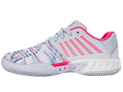 Introducing the K-Swiss Express Light 3 HB Indoor Court Women's Tennis Shoes in Arctic, White, and Neon Pink. Designed for tennis enthusiasts, this stylish footwear features a light gray base accented with vibrant pink and blue. It comes equipped with a textured sole for enhanced grip, a striking striped side pattern, and a plush pink inner lining—perfectly blending sporty aesthetics with comfortable wear.