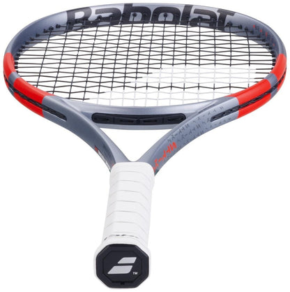The Babolat Pure Strike Team Gen4 Tennis Racket in Carbon Grey, shown handle-forward with a white grip and black strings, delivers control and forgiveness for players on the court.