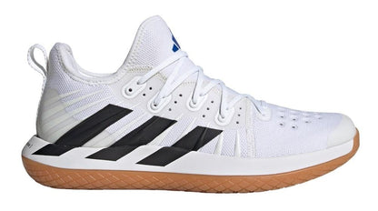 The ADIDAS Stabil Next Gen Primeblue Men's Indoor Shoes in Cloud White and Core Black are designed by adidas, featuring a breathable mesh upper with signature black stripes, white laces, and a gum rubber sole. These shoes incorporate energy return technology and have a loop at the heel, offering a sleek design perfect for sports activities and indoor court use.